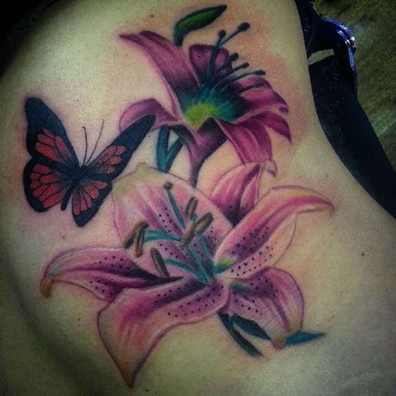 Purple Ink Lily Flowers With Flying Butterfly Tattoo Design