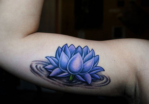 Purple Ink Lotus Flower In Water Tattoo On Right Bicep