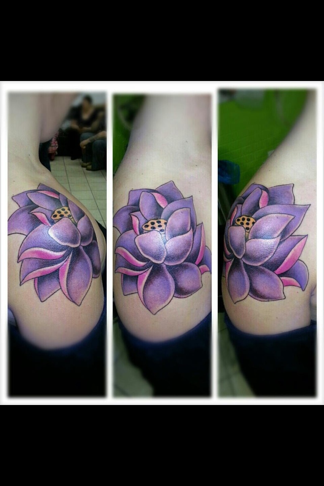 Purple Ink Lotus Tattoo On Right Shoulder