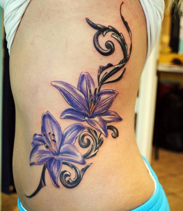 Purple Lily Flowers Tattoo On Side Rib