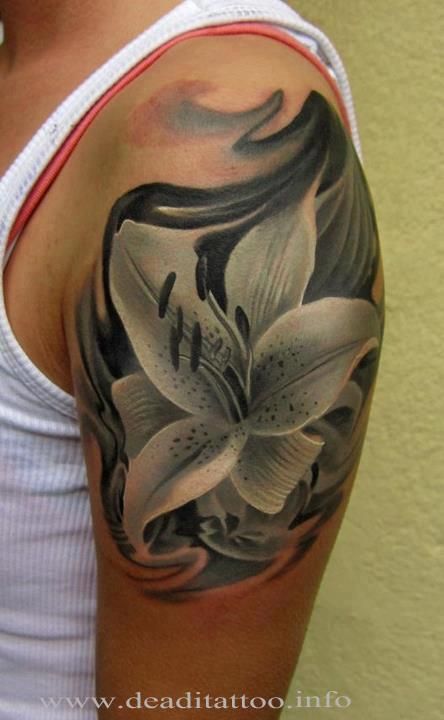 Realistic Black And Grey Lily Tattoo On Left Shoulder