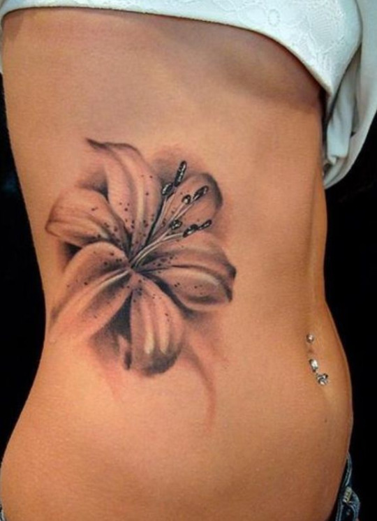 Realistic Grey Ink Tiger Lily Tattoo On Side Rib