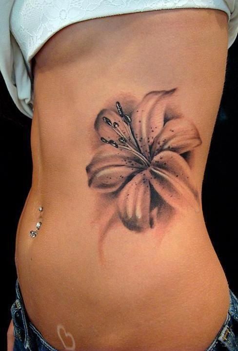 Realistic Lily Flower Tattoo On Girl Side Rib