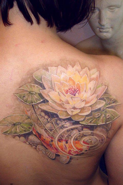 Realistic Lotus Flower With Koi Fish Tattoo On Right Back Shoulder