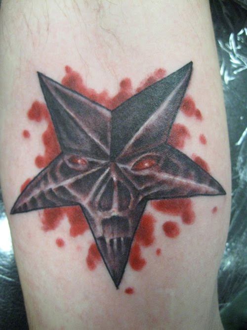Red Eyes Skull Nautical Star Tattoo