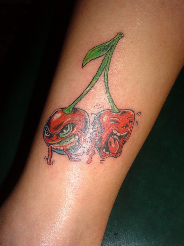 Red Ink Cherry Skull Tattoos On Leg