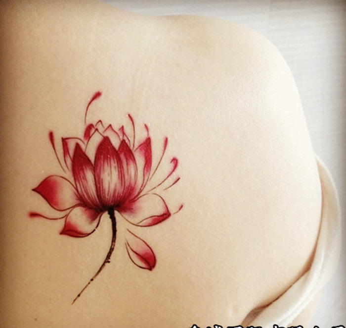Red Ink Lotus Flower Tattoo On Right Back Shoulder