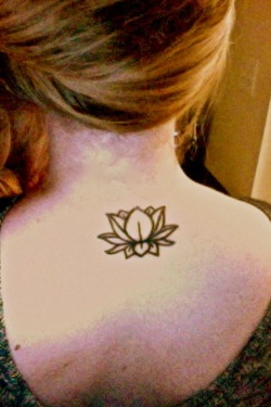 Simple Black Outline Lotus Tattoo On Girl Upper Back