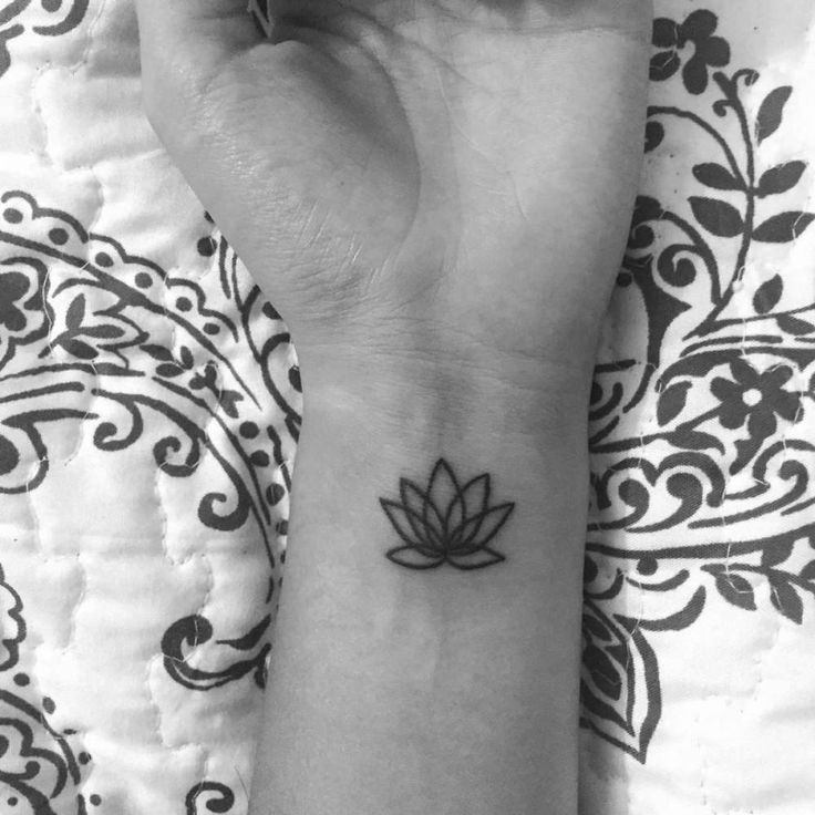 Simple Black Outline Lotus Tattoo On Left Wrist