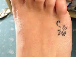 Simple Black Outline Lotus Tattoo On Right Foot