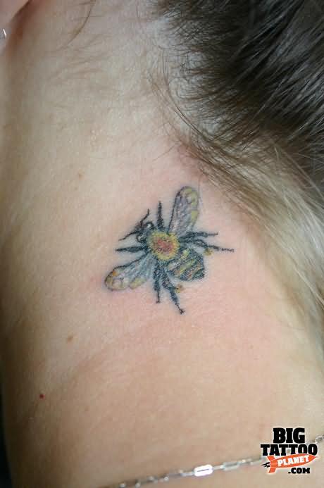 Simple Bumblebee Tattoo On Left Behind The Ear