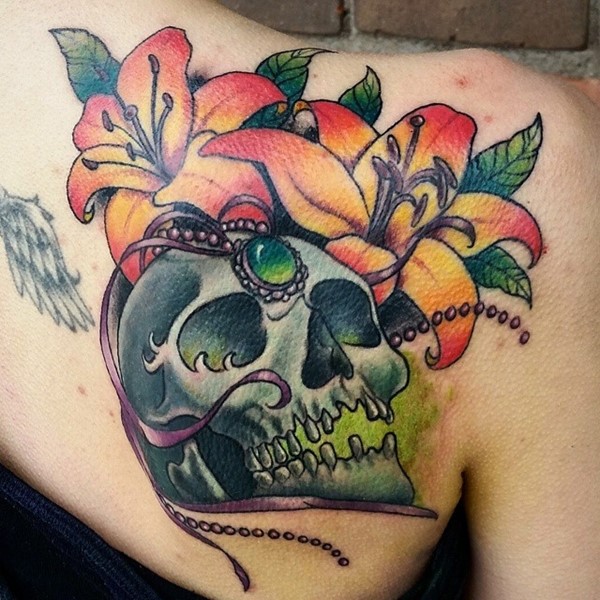 Skull And Lily Flowers Tattoo On Right Back Shoulder