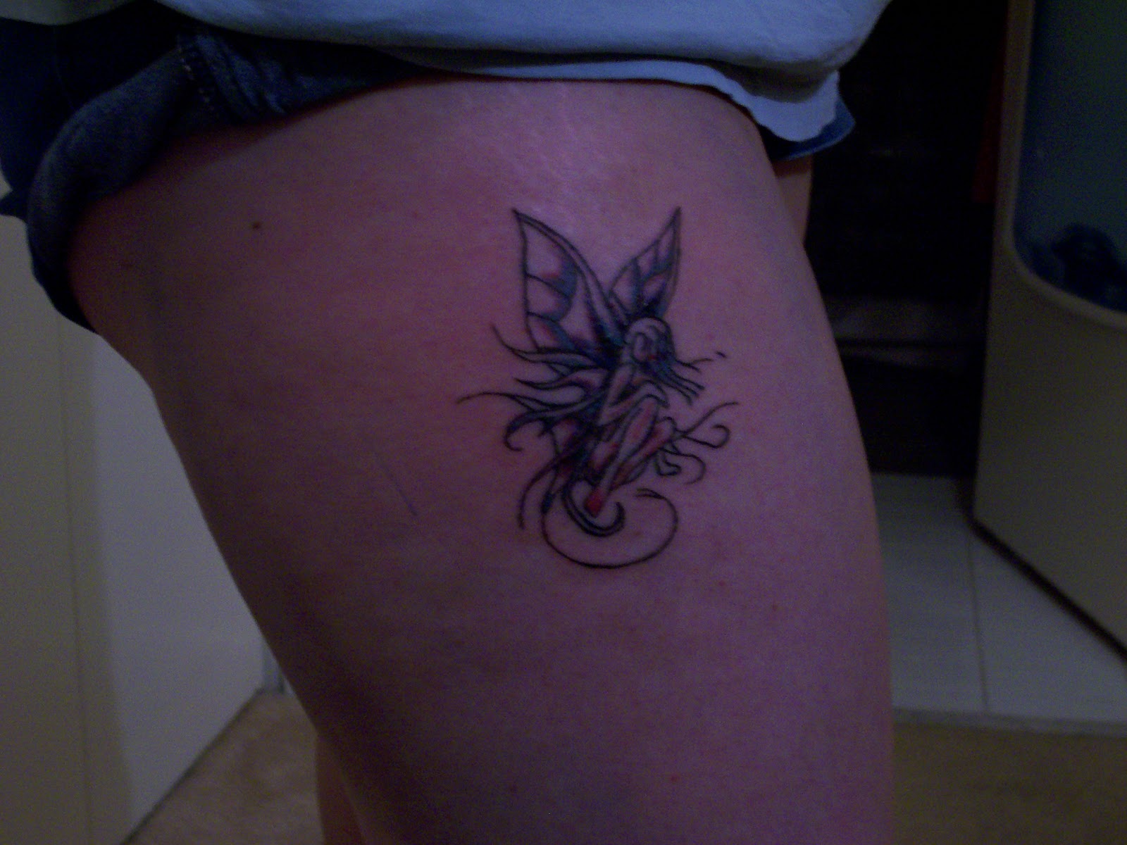 Small Fairy Tattoo On Girl Right Side Thigh