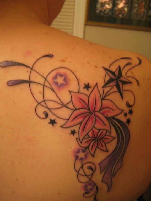 Small Nautical Star And Lily Flowers Tattoo On Back Shoulder