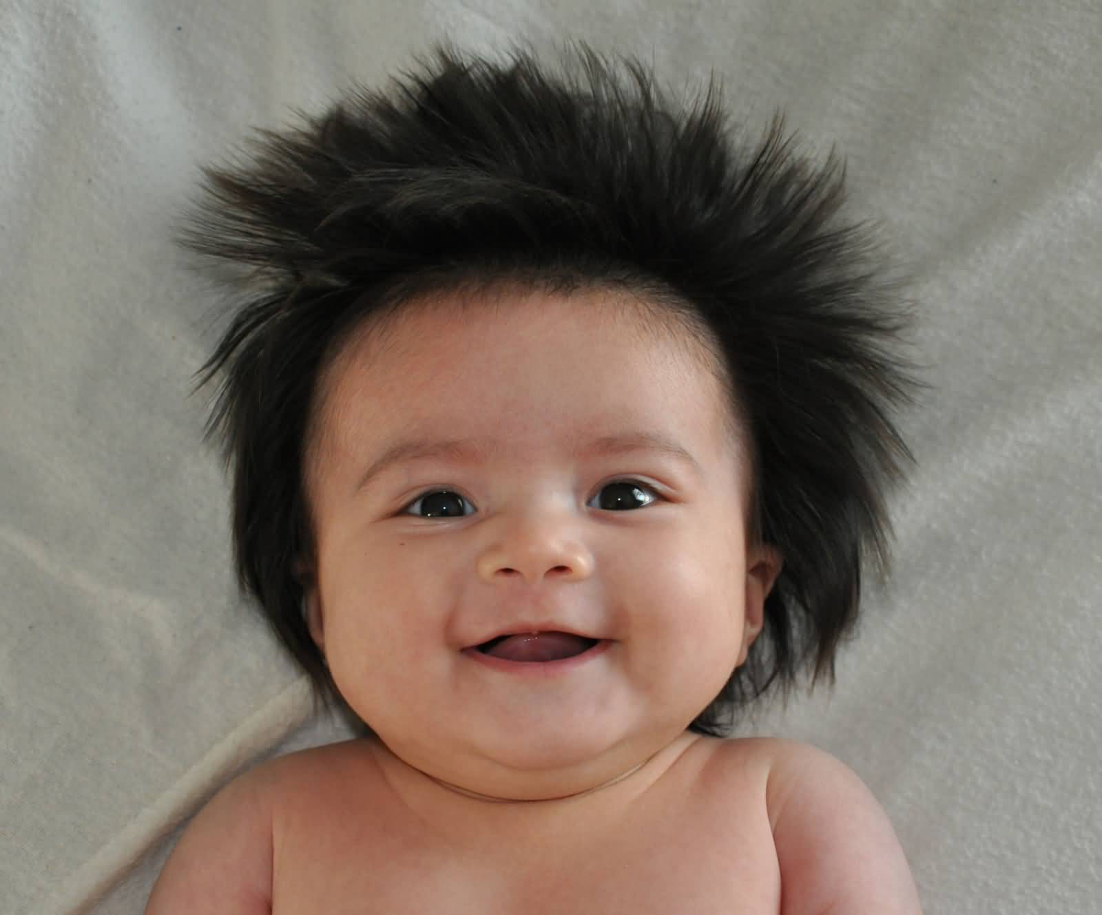 Smiling Baby With Funny Hairstyle