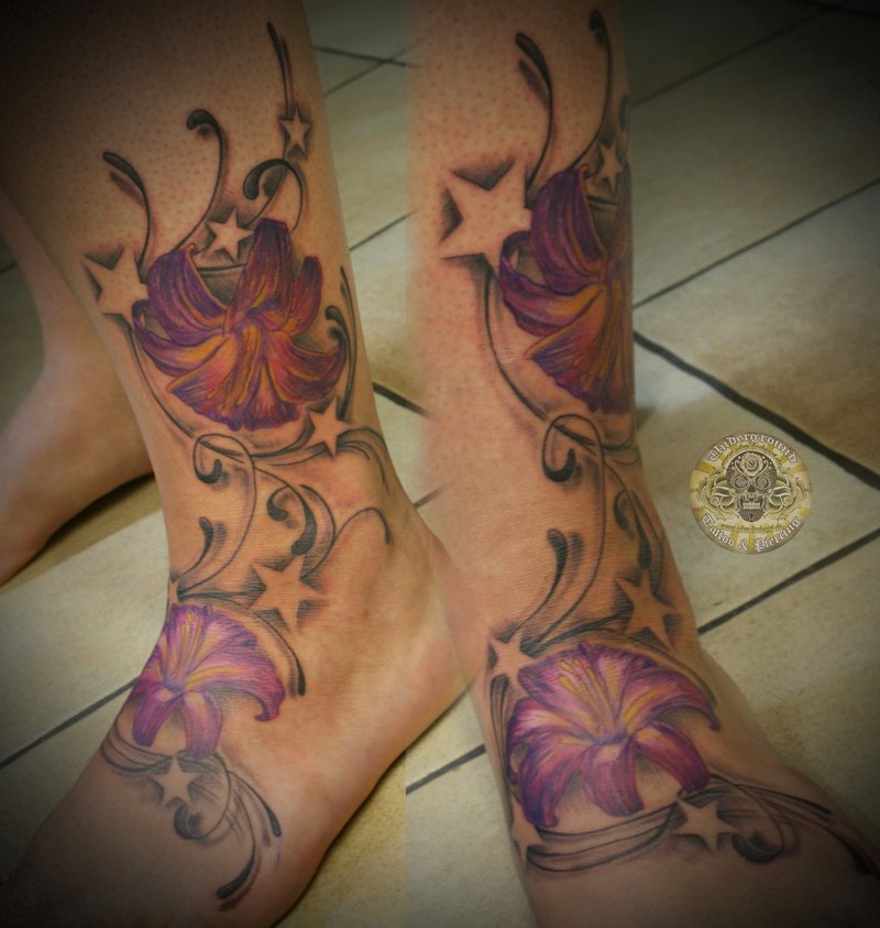 Star And Lily Flower Tattoo On Foot
