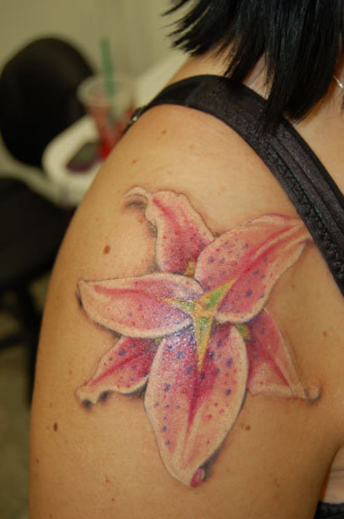 Stargazer Lily Tattoos On Girl Shoulder