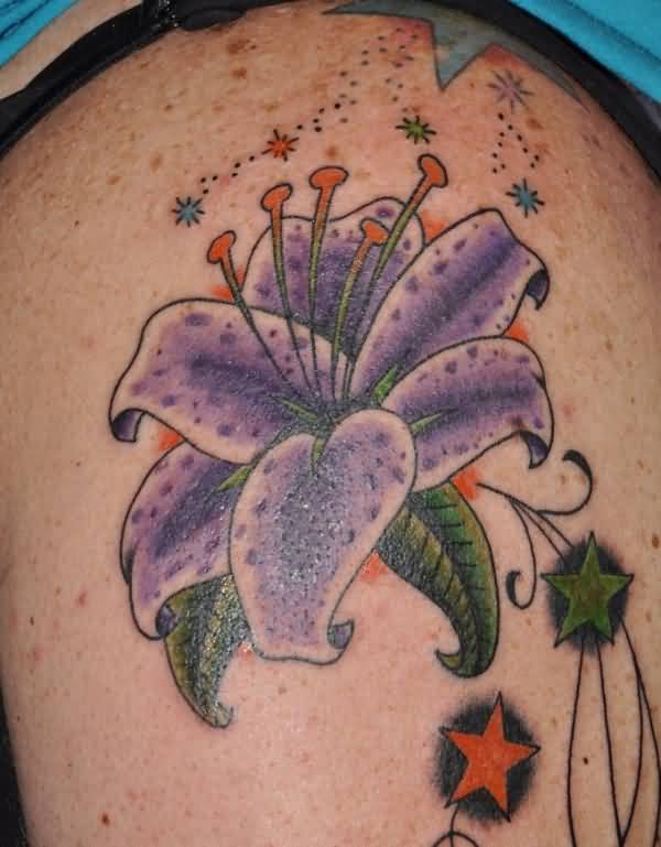 Stars And Purple Lily Flower Tattoo On Shoulder
