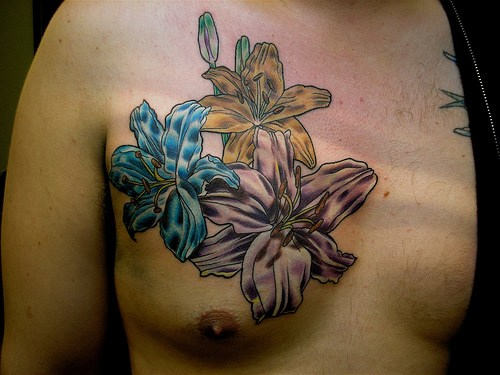 Three Lily Flowers Tattoos On Chest