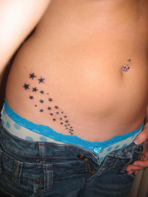 Tiny Star Tattoos On Girl Stomach