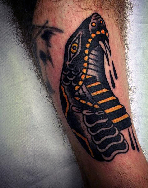 Traditional Black And Yellow Snake Head Tattoo Design For Arm