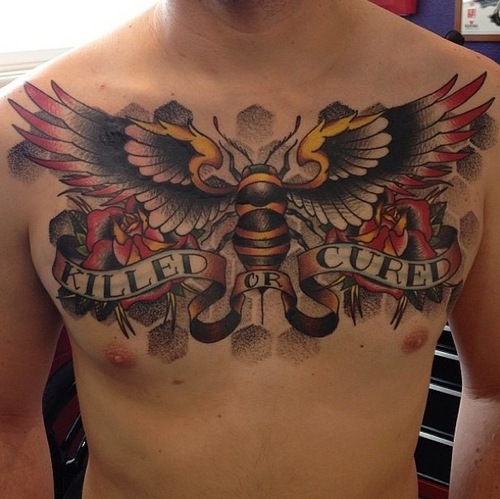 Traditional Bumblebee With Roses And Banner Tattoo On Man Chest