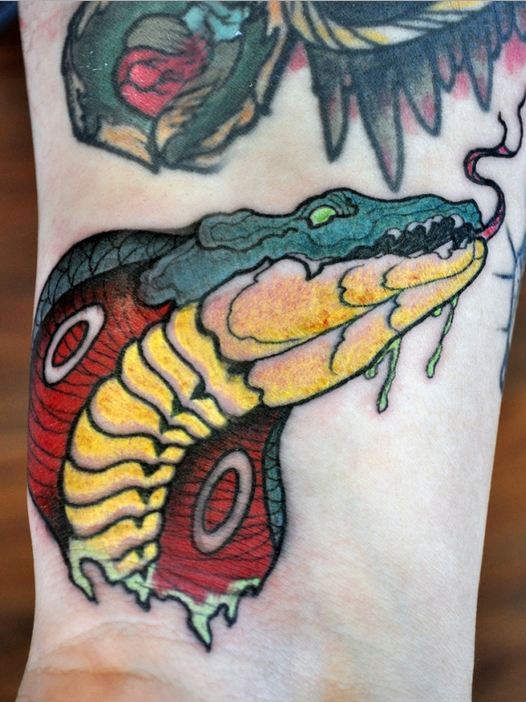 Traditional Cobra Snake Head Tattoo On Right Wrist