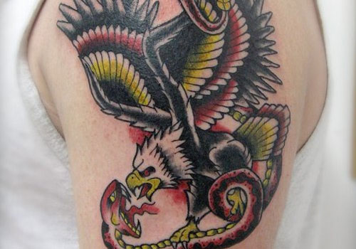 Traditional Eagle With Snake Tattoo On Left Shoulder