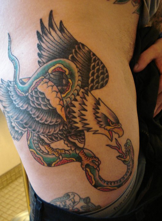 Traditional Eagle With Snake Tattoo On Right Side Rib