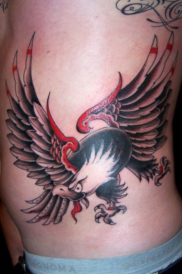Traditional Flying Eagle Tattoo On Side Rib