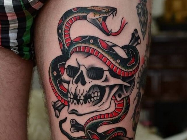 Traditional Japanese Snake With Skull Tattoo On Left Thigh