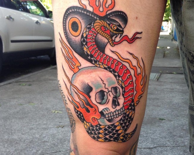 Traditional Japanese Snake With Skull Tattoo On Right Thigh