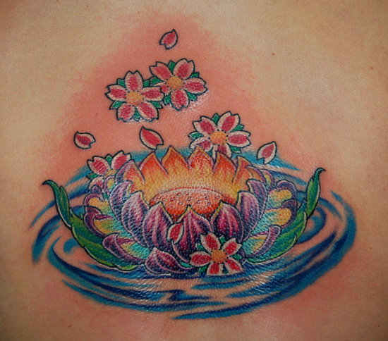 Traditional Lotus Flower In Water Tattoo Design