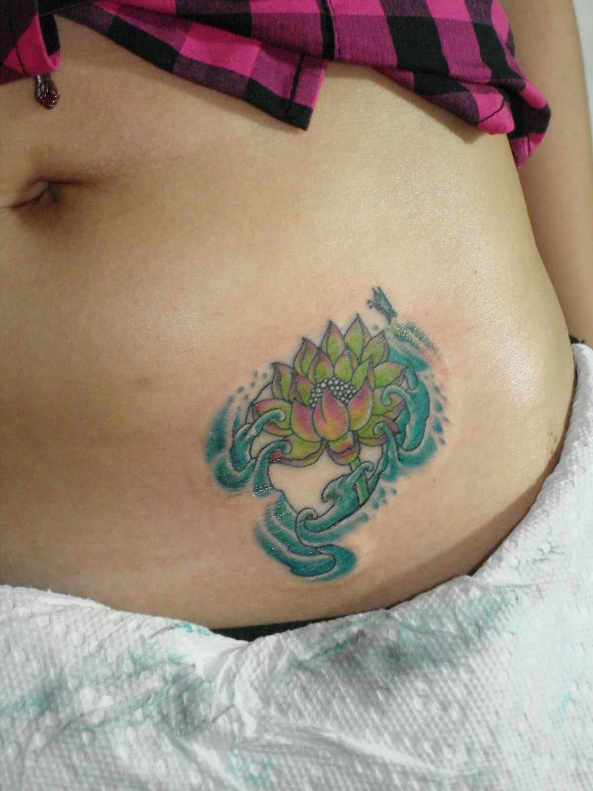 Traditional Lotus Flower Tattoo On Girl Hip