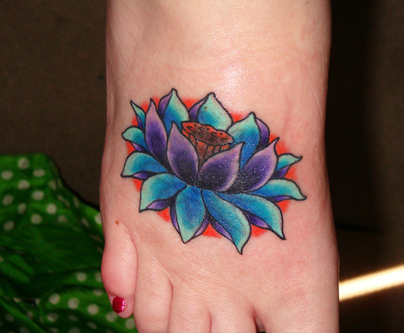 Traditional Lotus Flower Tattoo On Girl Right Foot