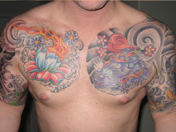 Traditional Lotus Flower With Dragon Tattoo On Man Chest