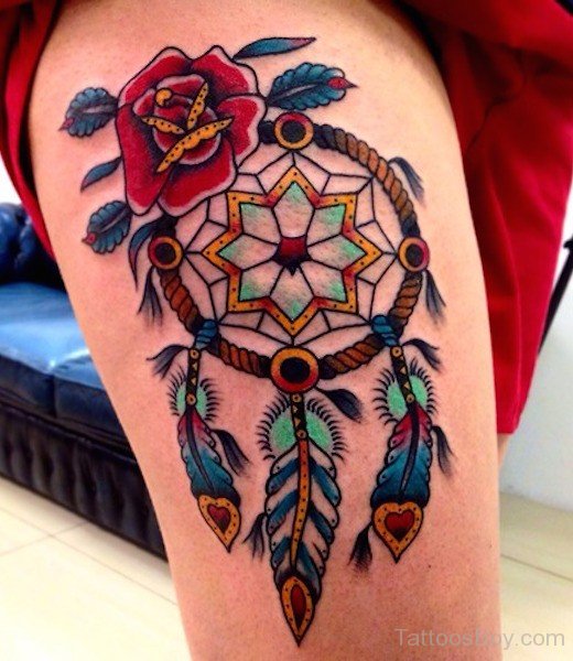 Traditional Rose Flower And Dreamcatcher Tattoo On Thigh