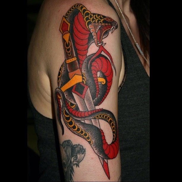 Traditional Snake With Dagger Tattoo On Right Shoulder