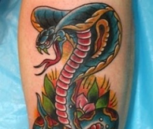Traditional Snake With Flowers Tattoo Design For Leg Calf