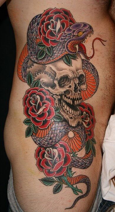 Traditional Snake With Skull And Roses Tattoo On Side Rib