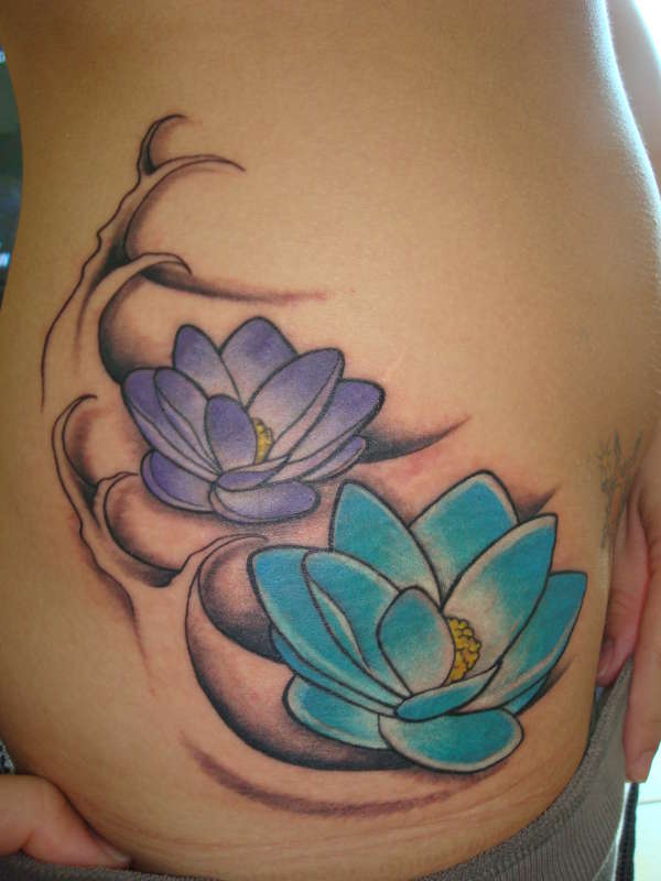 Two Japanese Lotus Flowers Tattoo On Girl Right Hip