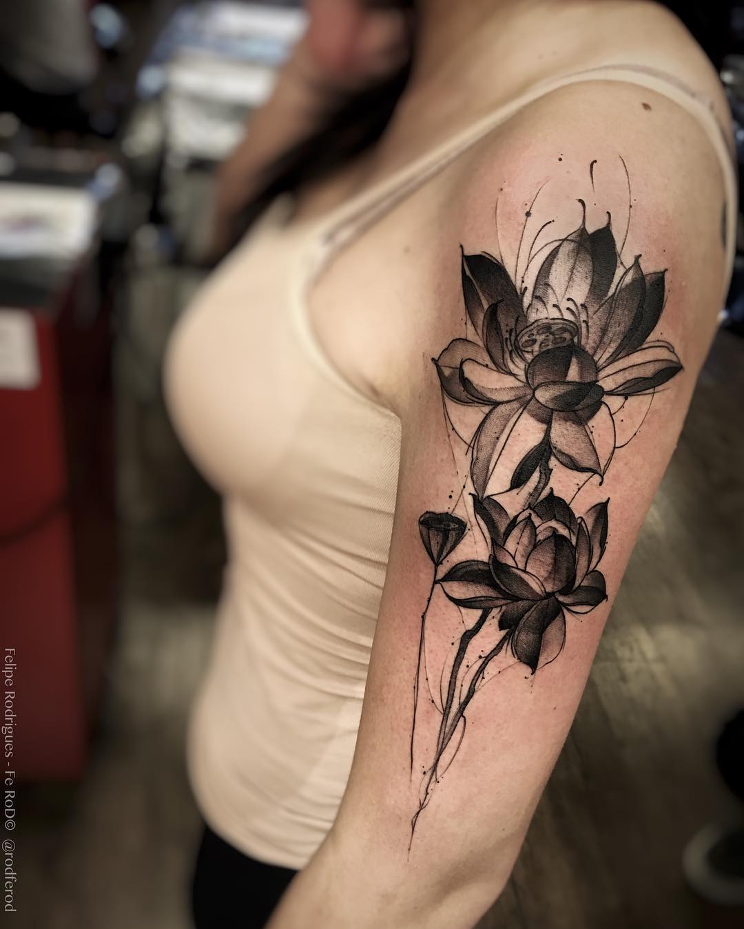 Unique Black Ink Lotus Flower Tattoo On Women Left Half Sleeve
