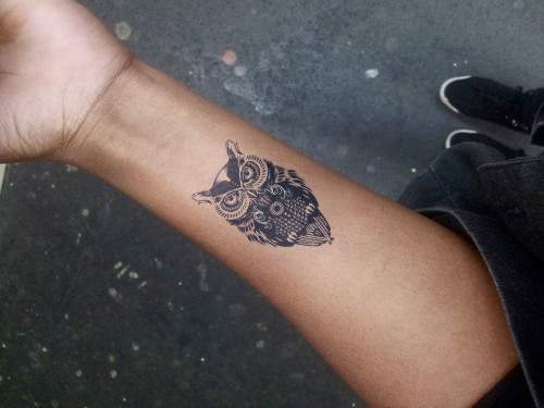 Unique Black Ink Owl Tattoo On Left Wrist