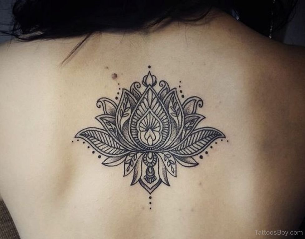 Unique Black Lotus Flower Tattoo On Girl Upper Back By Caro Voodoo