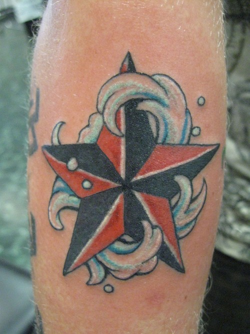 Water Splash And Nautical Star Tattoo On Arm