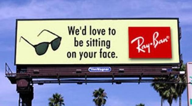We'd Love To Be Sitting On Your Face Funny Ray-Ban Advertisement