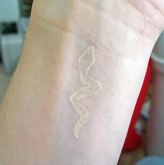 White Ink Snake Tattoo Design For Wrist