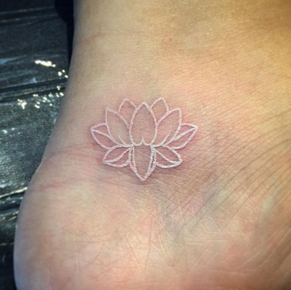 White Outline Lotus Flower Tattoo On Right Ankle