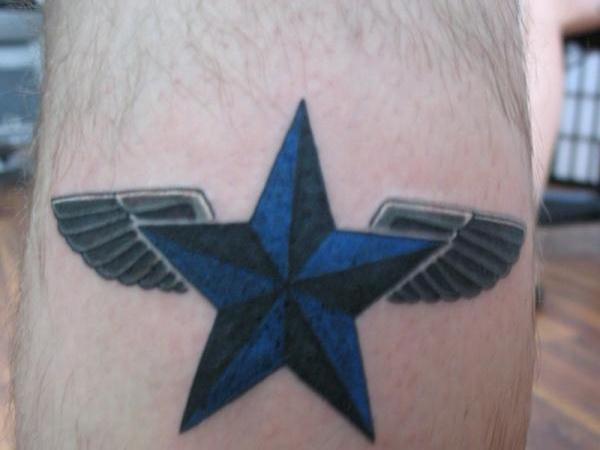 Winged Black And Blue Nautical Star Tattoo