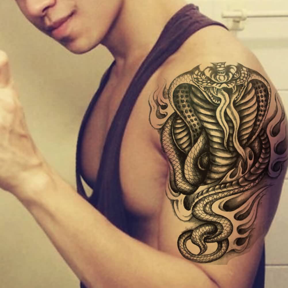 Wonderful Black Ink Cobra Snake Tattoo On Man Left Half Sleeve